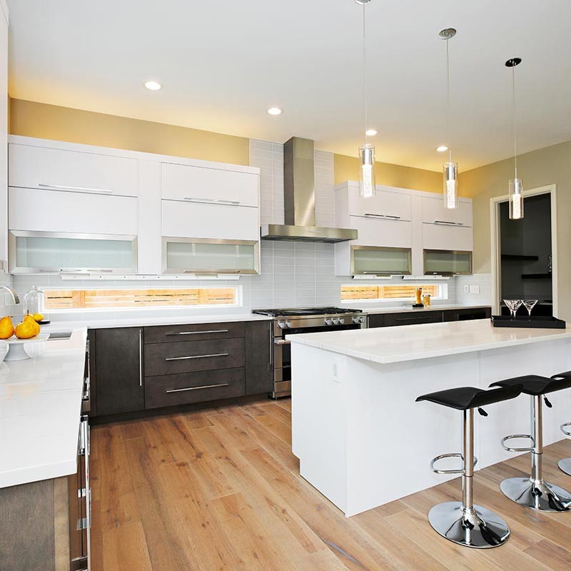 White quartz kitchen countertop being installed