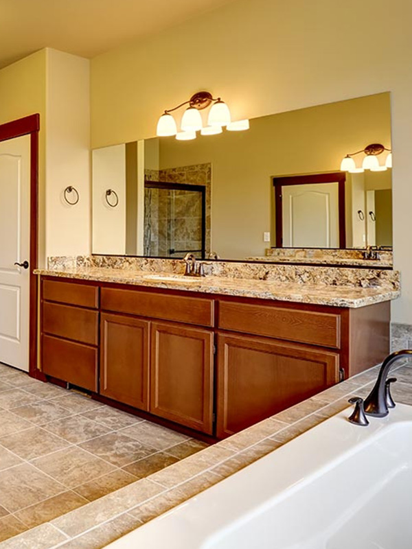 Bathroom cabinets and granite vanity top in Peoria