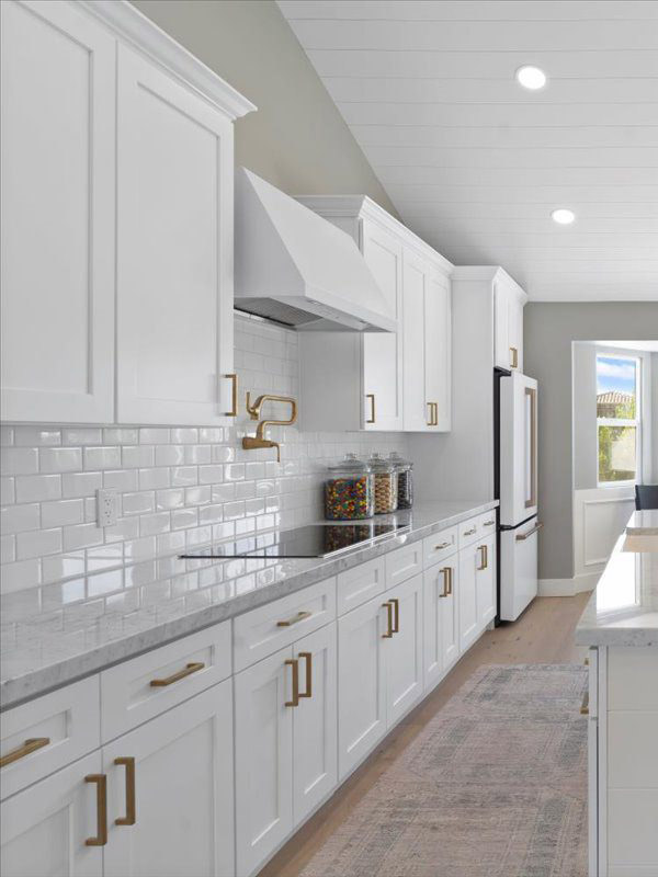 Finished Scottsdale kitchen with stone countertops and island